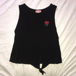 Black shirt with a rose.
